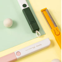 HKM-102611 Electrostatic Carry Clothes Hair Removal Brush - Compact Design in Yellow, Green, and Pink