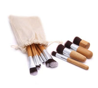 HKM-919827 11-Piece Bamboo Handle Makeup Brush Set with Linen Bag for Blush and Foundation Application
