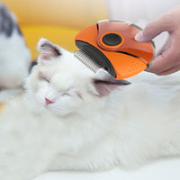 HKM-839315 3-in-1 Rotating Pet Comb Brush in Orange and Green - ABS, PC, Stainless Steel, Compact Size