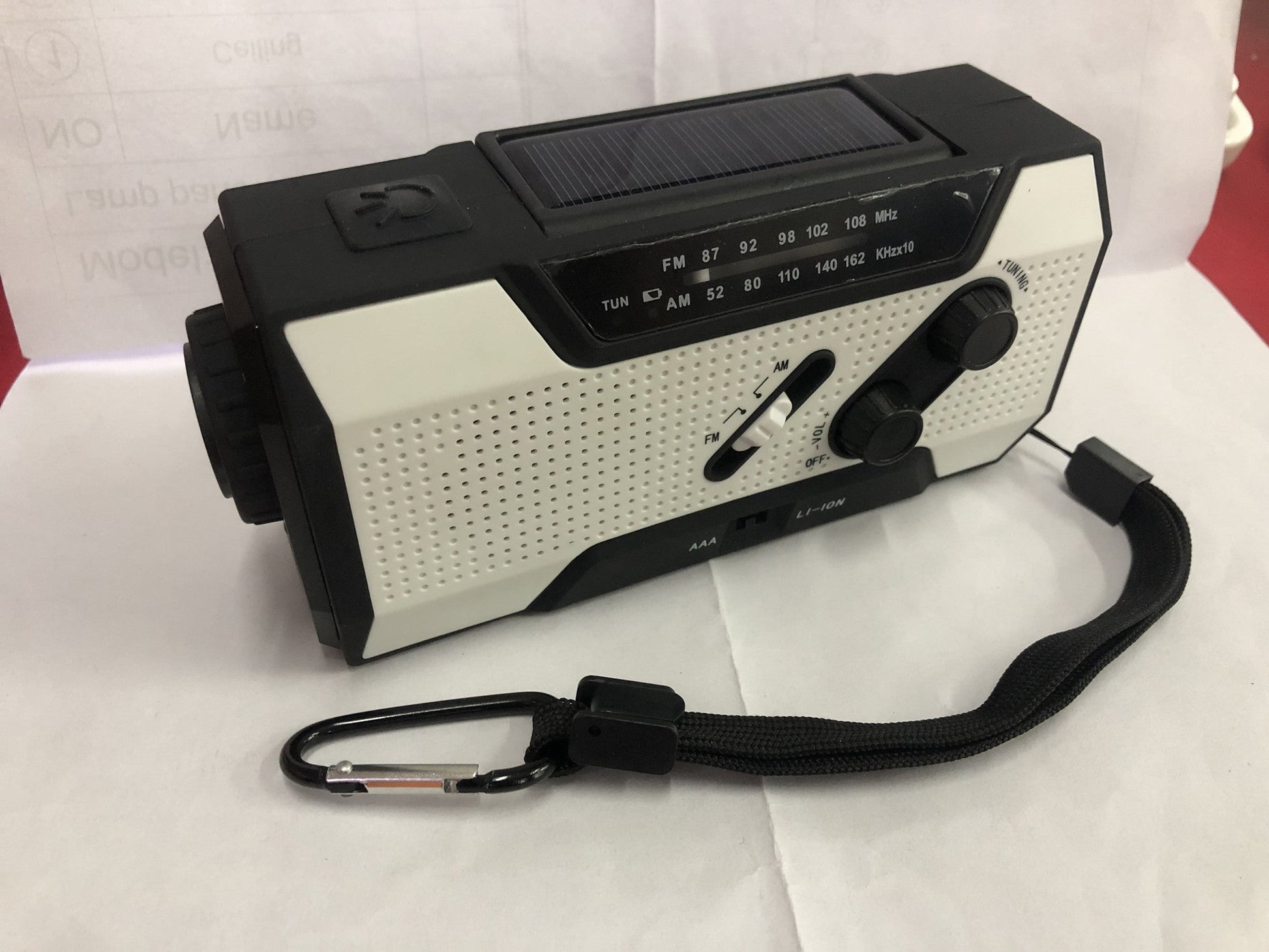 KTX-912211 Hand Crank Solar-Powered Emergency Radio with USB Charging and LED Flashlight
