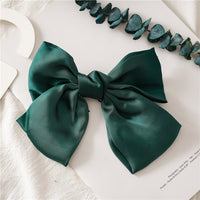 HKM-682899 Elegant Bow Hair Clip in Tribute Silk with Alloy Detailing and Elastic Band, Perfect for Special Occasions