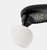 HKM-831251 Multi-Function Beauty Instrument with Heat, Vibration, and Vacuum Suction in Black and White