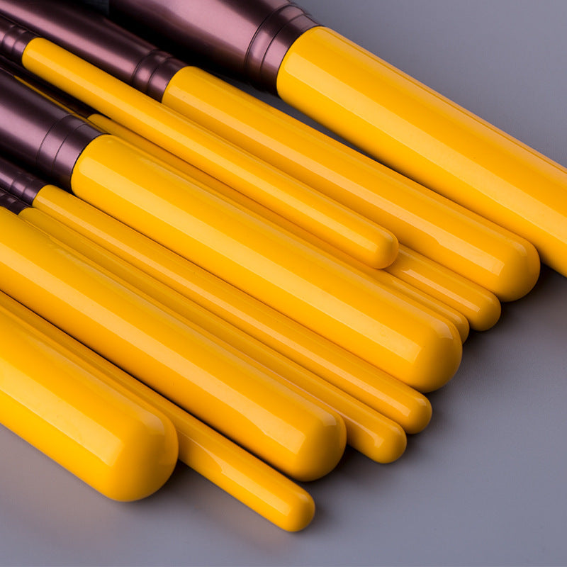 HKM-692755 11-Piece Yellow Duck Makeup Brush Set with Wooden Handles and Soft Bristles