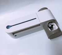 HKM-527955 Ultraviolet Toothbrush Sterilizer and Automatic Toothpaste Squeezer in White