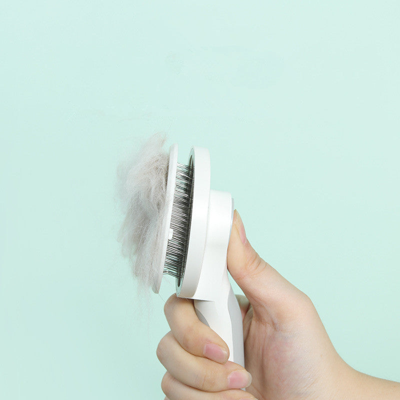 HKM-133075 Self-Cleaning Round Handle Pet Comb with Sticky Bead Steel Teeth for Easy Hair Removal