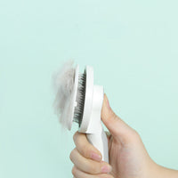 HKM-133075 Self-Cleaning Round Handle Pet Comb with Sticky Bead Steel Teeth for Easy Hair Removal