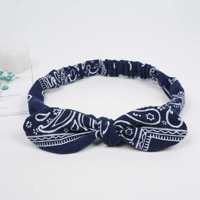 HKM-030995 Geometric Knotted Fabric Headband with Bunny Ears for Women