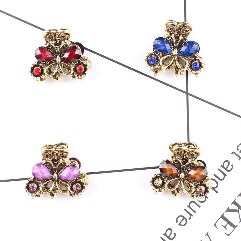 HKM-049107 Antique Bronze Butterfly Hairpin with Gemstones in Purple, Blue, Red, and Brown