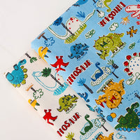 HKM-022035 Cotton Canvas DIY Fabric featuring Cute Cartoon Dinosaurs - Available in Blue and White, 110CMx45CM