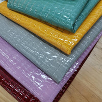 HKM-077523 Bubble Gum High-Gloss PU Leather Fabric - 140cm Wide, Stone Texture