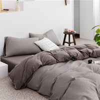HKM-085907 Cotton Knitted Four-Piece Bedding Set with Geometric Patterns in Various Colors