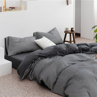 HKM-085907 Cotton Knitted Four-Piece Bedding Set with Geometric Patterns in Various Colors