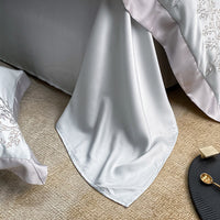HKM-147987 Lyocell Fiber Four-Piece Bed Sheet Set with Embroidery and Lace, Solid Color