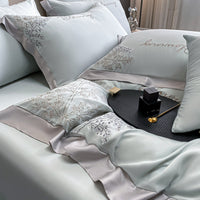 HKM-147987 Lyocell Fiber Four-Piece Bed Sheet Set with Embroidery and Lace, Solid Color