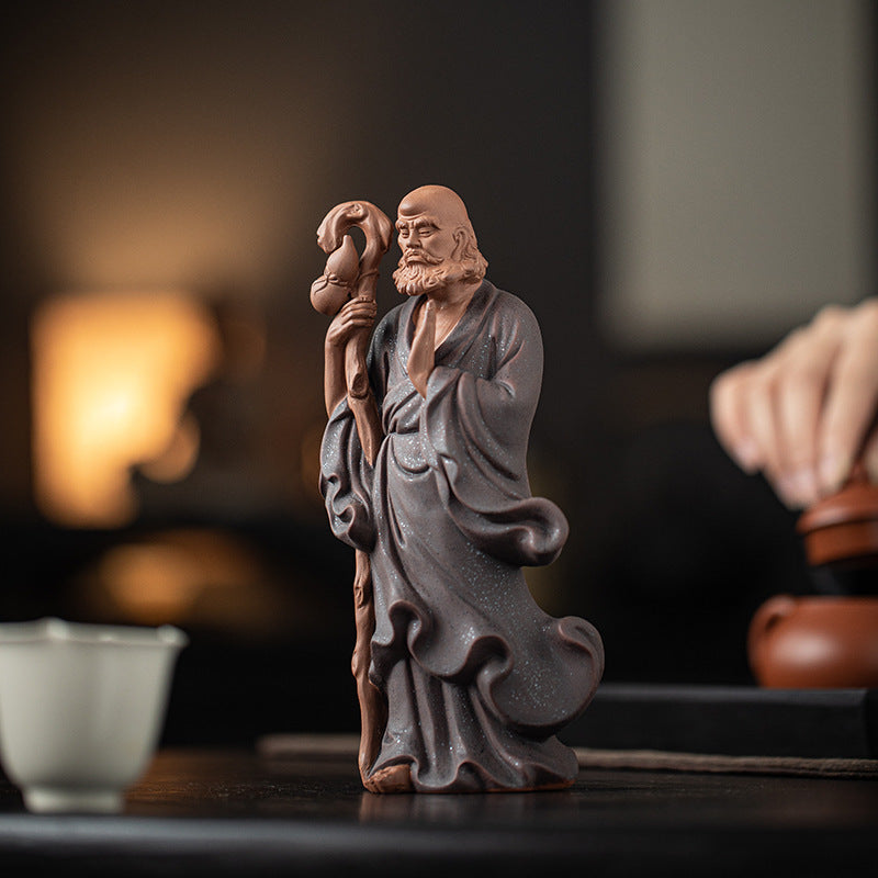 HKM-149907 Zen-Inspired Ceramic Ancestor Ornament - Crossing the River by Bodhidharma in Dujiang DALMORE-Black