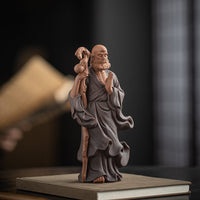 HKM-149907 Zen-Inspired Ceramic Ancestor Ornament - Crossing the River by Bodhidharma in Dujiang DALMORE-Black