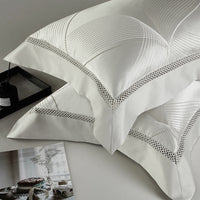 HKM-166099 High Precision Four-piece Jacquard Cotton Bedding Set with Floral Design in Solid Colors