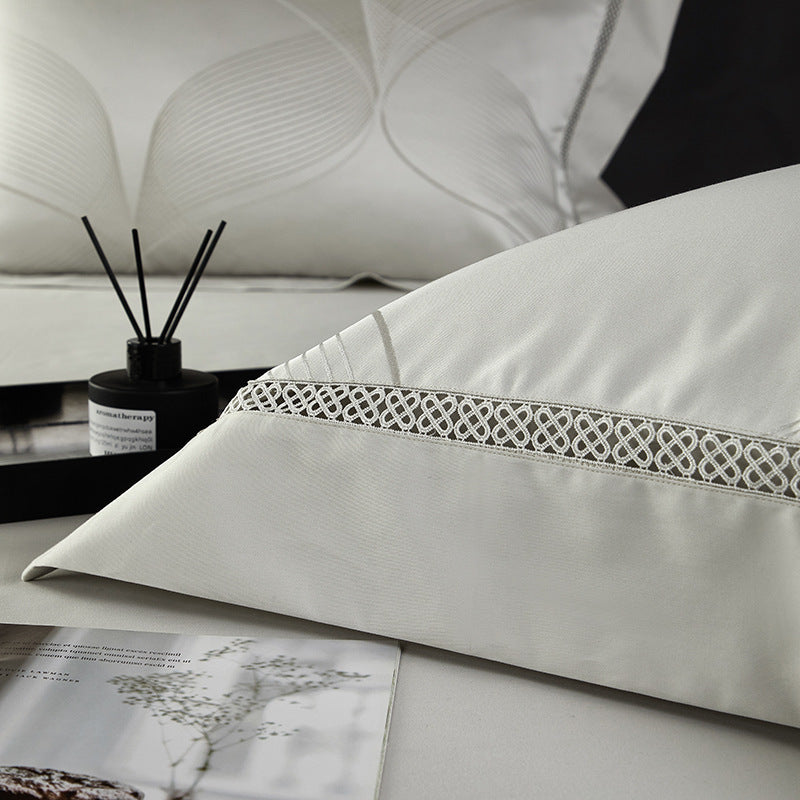 HKM-166099 High Precision Four-piece Jacquard Cotton Bedding Set with Floral Design in Solid Colors