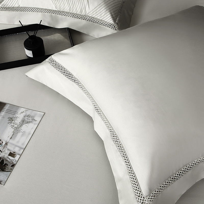 HKM-166099 High Precision Four-piece Jacquard Cotton Bedding Set with Floral Design in Solid Colors