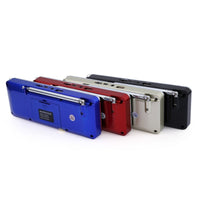 HKM-178515 Portable Bluetooth Speaker with AM/FM Radio, Rechargeable Battery, LCD Display, and Multi-format Playback Support