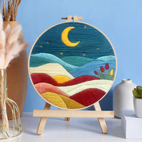 HKM-224659 Mountain, Sun, and Moon Landscape Embroidery Kit with Frame, Scissors, and Needle Threader - 29x29CM