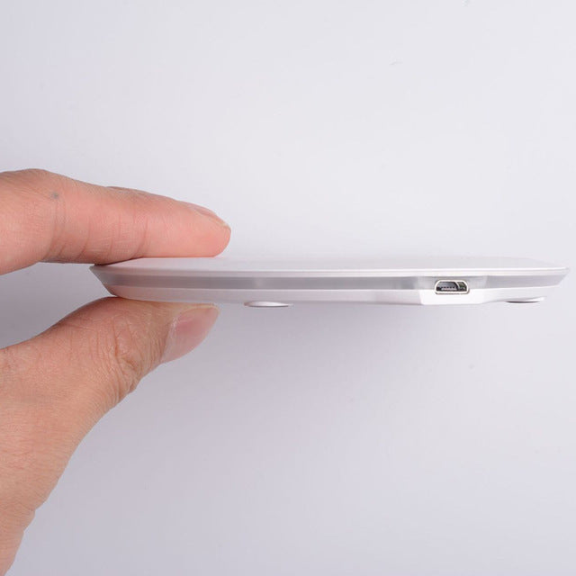 HKM-251795 Ultra-Thin Wireless Mobile Phone Charger with Indication Function and USB Interface