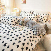 HKM-252691 Winter Coral Velvet Four-Piece Bedding Set with Fun Patterns and Soft Material