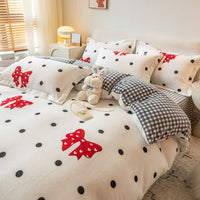 HKM-252691 Winter Coral Velvet Four-Piece Bedding Set with Fun Patterns and Soft Material