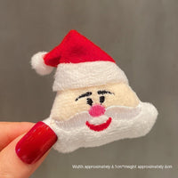 HKM-259411 Christmas Cartoon Character Brooch Decoration with Snowflake Design