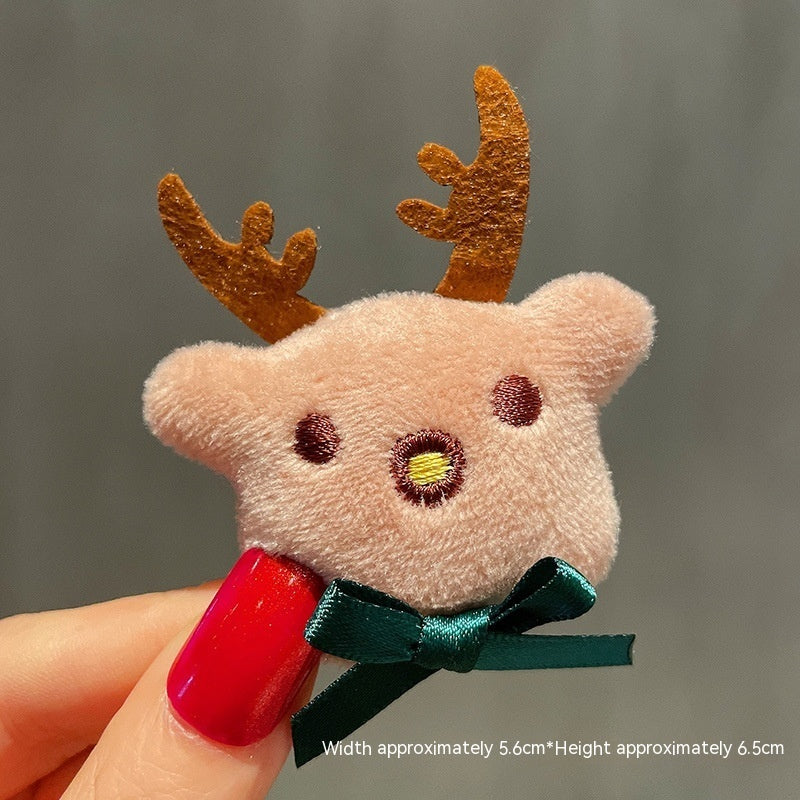 HKM-259411 Christmas Cartoon Character Brooch Decoration with Snowflake Design