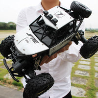 HKM-282195 1/12 Scale 4WD Off-Road Remote Control Truck with LED Lights and Metal Construction