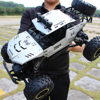 HKM-282195 1/12 Scale 4WD Off-Road Remote Control Truck with LED Lights and Metal Construction