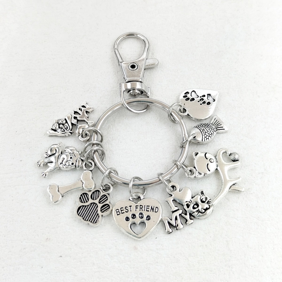 HKM-320723 Silver Dog Paw Key Ring with Cat Fish Footprints Design