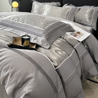 HKM-332883 Jacquard Four-Piece Cotton Bedding Set with Stripe and Geometric Patterns
