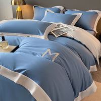 HKM-338835 Light Luxury Four-Piece Cotton Bedding Set with Embroidery and Customized Sizes