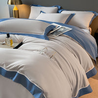 HKM-338835 Light Luxury Four-Piece Cotton Bedding Set with Embroidery and Customized Sizes