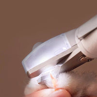 HKM-339027 LED Pet Nail Clipper with Built-in File and Safety Baffle for Easy and Precise Trimming
