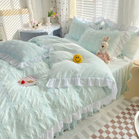 HKM-342611 Seersucker Solid Color Four-Piece Quilt Cover Set with Bed Skirt and Pillowcases