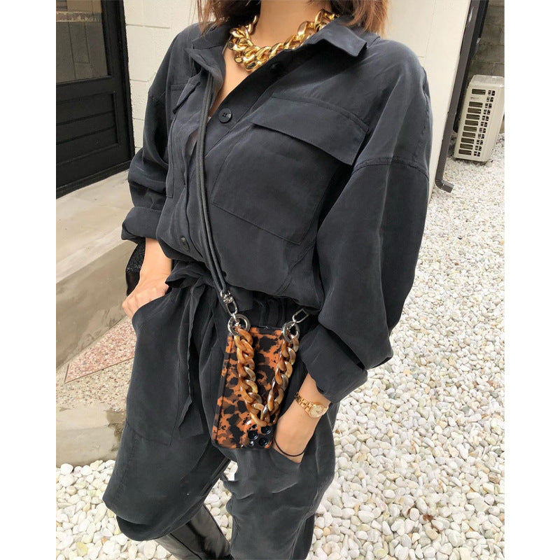 HKM-391123 Amber Leopard Belt with Diagonal Chain for Apple iPhone Models 7/8/SE 2020, 7 Plus/8 Plus, X/XS, XR, XS Max, 11, 11 Pro, 11 Pro Max, 12 Mini, 12, 12 Pro, 12 Pro Max – Silicone Back Cover