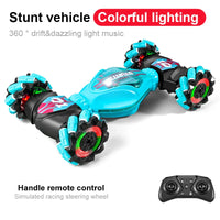 HKM-431955 Gesture Sensing 4WD RC Stunt Car with Dual Remote Control and 360 Rotating Drift Feature for Kids
