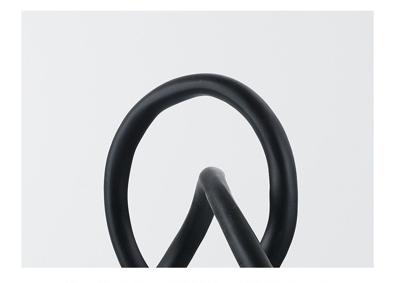 HKM-464083 Modern Black Resin Twisted Knot Abstract Geometric Ornament - Small and Large Sizes Available