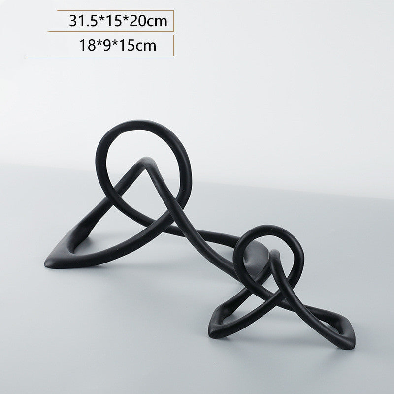 HKM-464083 Modern Black Resin Twisted Knot Abstract Geometric Ornament - Small and Large Sizes Available