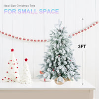 HKM-491603 3ft Snow Flocked Mini Christmas Tree with Pine Cones and Red Berries