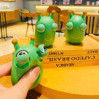 HKM-494419 Green Eye Bouncing Worm Squeeze Toy for Kids - Fun Novelty Gift for Ages 2 and Up
