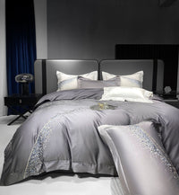 HKM-501843 Long-Staple Cotton Four-Piece Bedding Set with Embroidered Quilt Cover and Solid Color Design