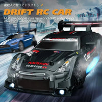 HKM-512723 1/24 Scale High Speed Remote Control Drift Car with Rechargeable Battery and LED Lights