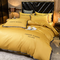 HKM-566227 Cotton Four-Piece Bedding Set with Embroidery Design and Personalized Fashion Elements
