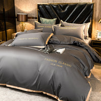 HKM-566227 Cotton Four-Piece Bedding Set with Embroidery Design and Personalized Fashion Elements
