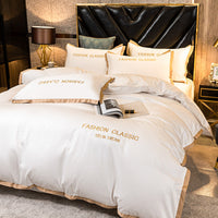 HKM-566227 Cotton Four-Piece Bedding Set with Embroidery Design and Personalized Fashion Elements