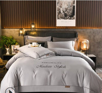 HKM-631763 European-Style Washed Silk Four-Piece Bedding Set with Lace Details in Ice Silk for 1.8m Beds